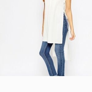 ASOS white sleeveless longline tunic.